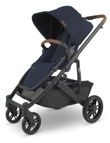 UPPAbaby Cruz V2 Stroller Full-Featured Stroller with Travel System Capabilities Toddler Seat, Bumper Bar, Bug Shield, Rain Shield Included Noa (Navy Carbon Frame Saddle Leather)